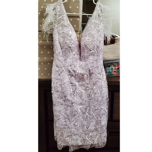 White Dress With V-Neck And Beading Style 